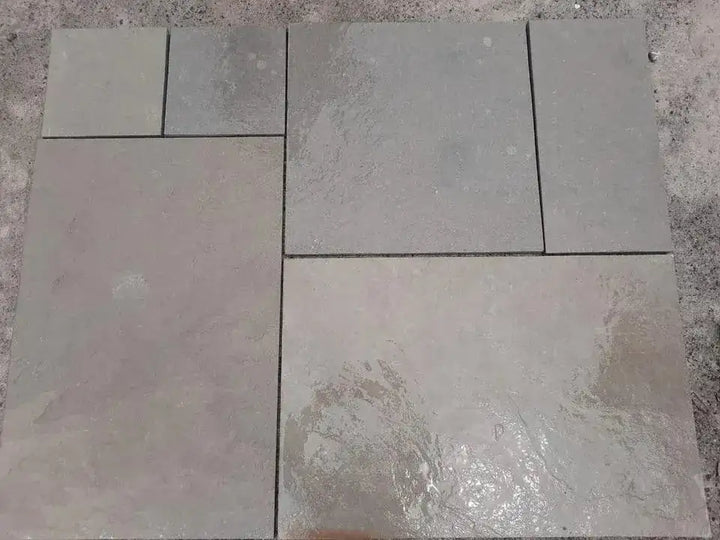 dove grey limestone paving wet